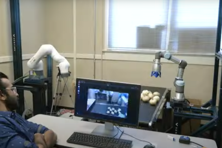 Robots being train to help processes foods.